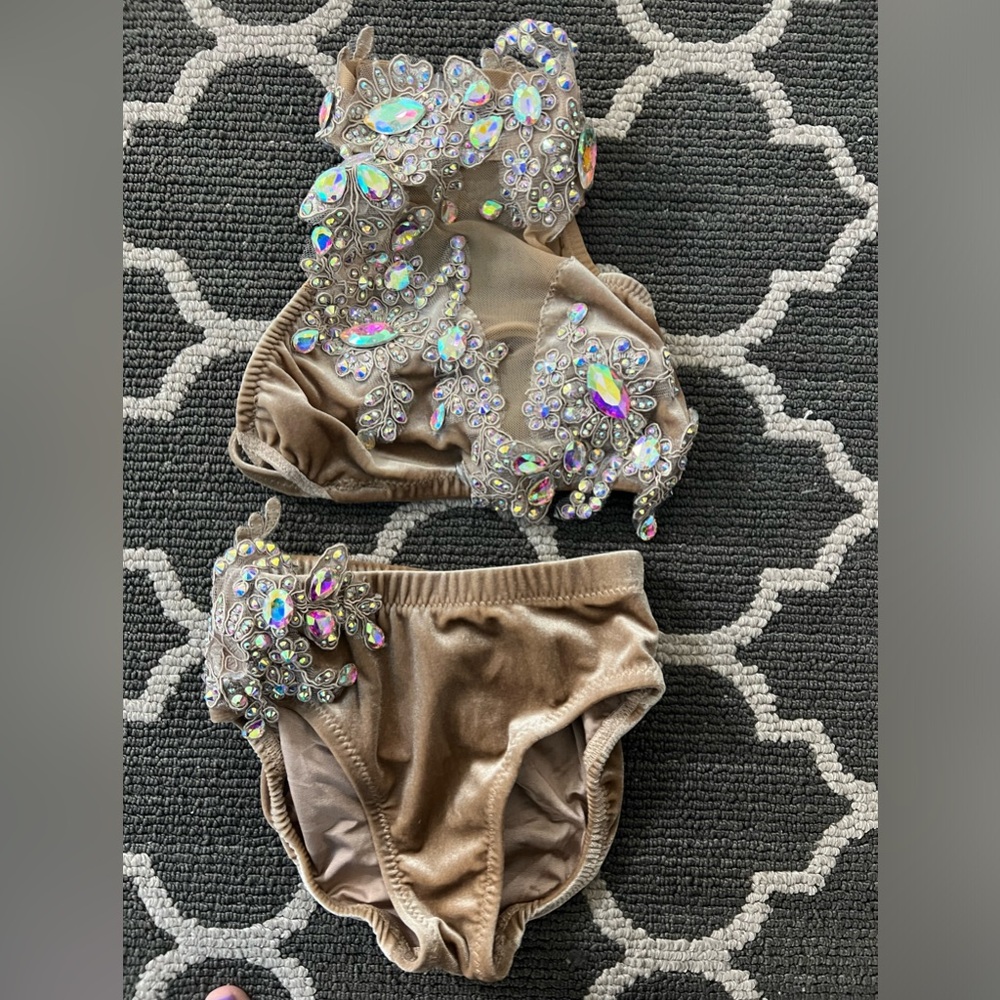 Nude 2 piece costume with skirt